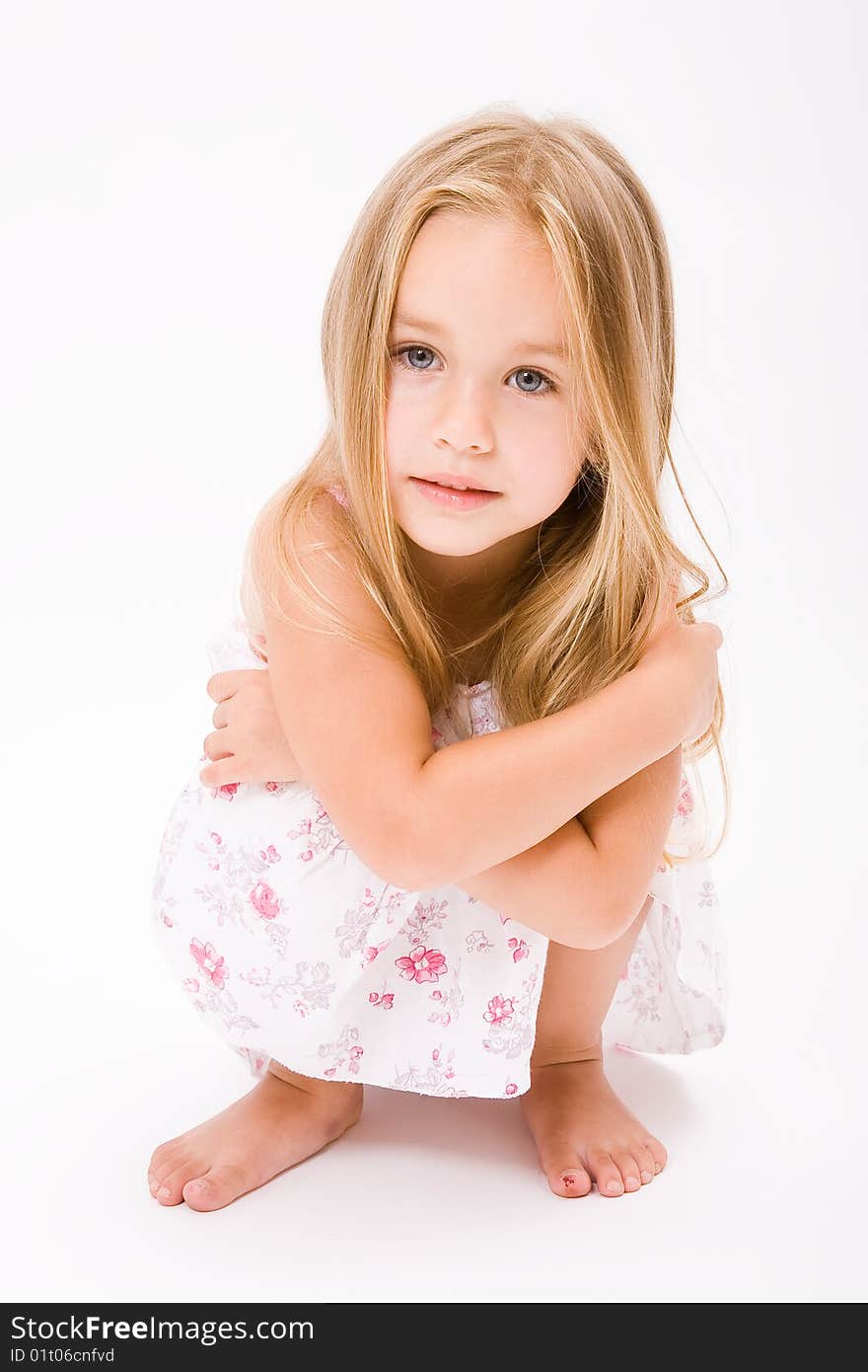 Beautiful little girl with long blonde hair