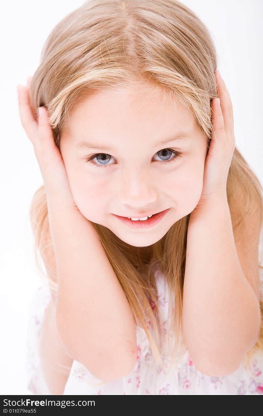 Beautiful little girl with long blonde hair