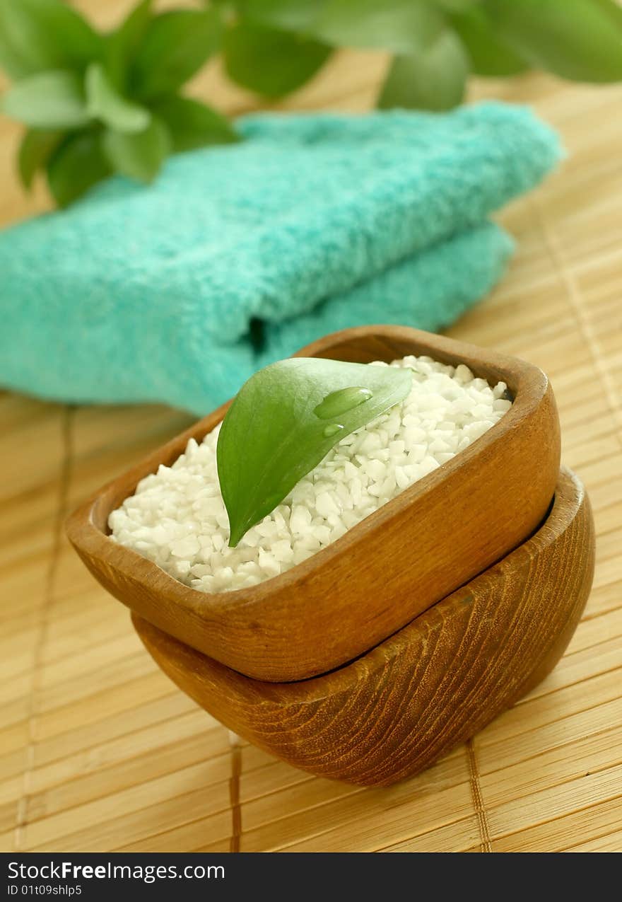 Bath Salt In Wooden Bowl And Towel