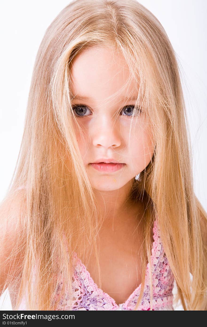 Beautiful little girl with long blonde hair