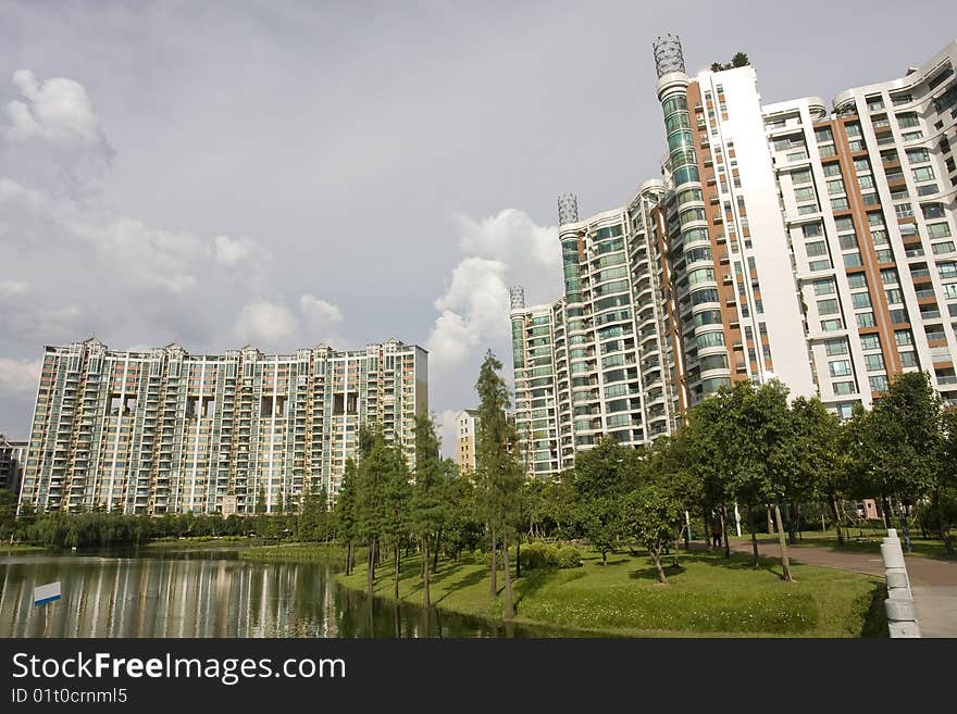 Chinese peaceful community with some modern buildings beside the lake. Chinese peaceful community with some modern buildings beside the lake