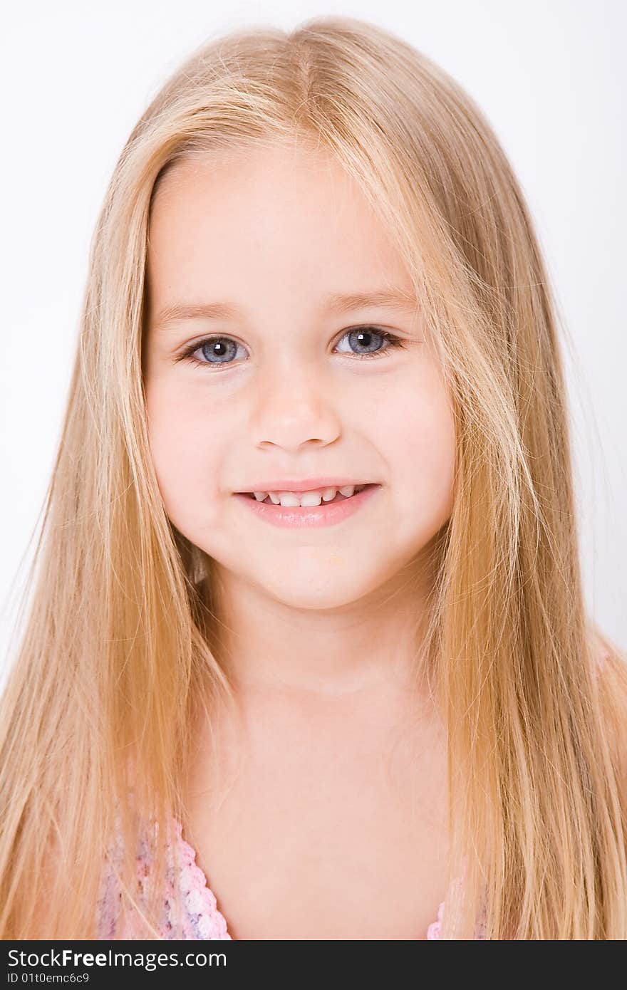 Beautiful little girl with long blonde hair