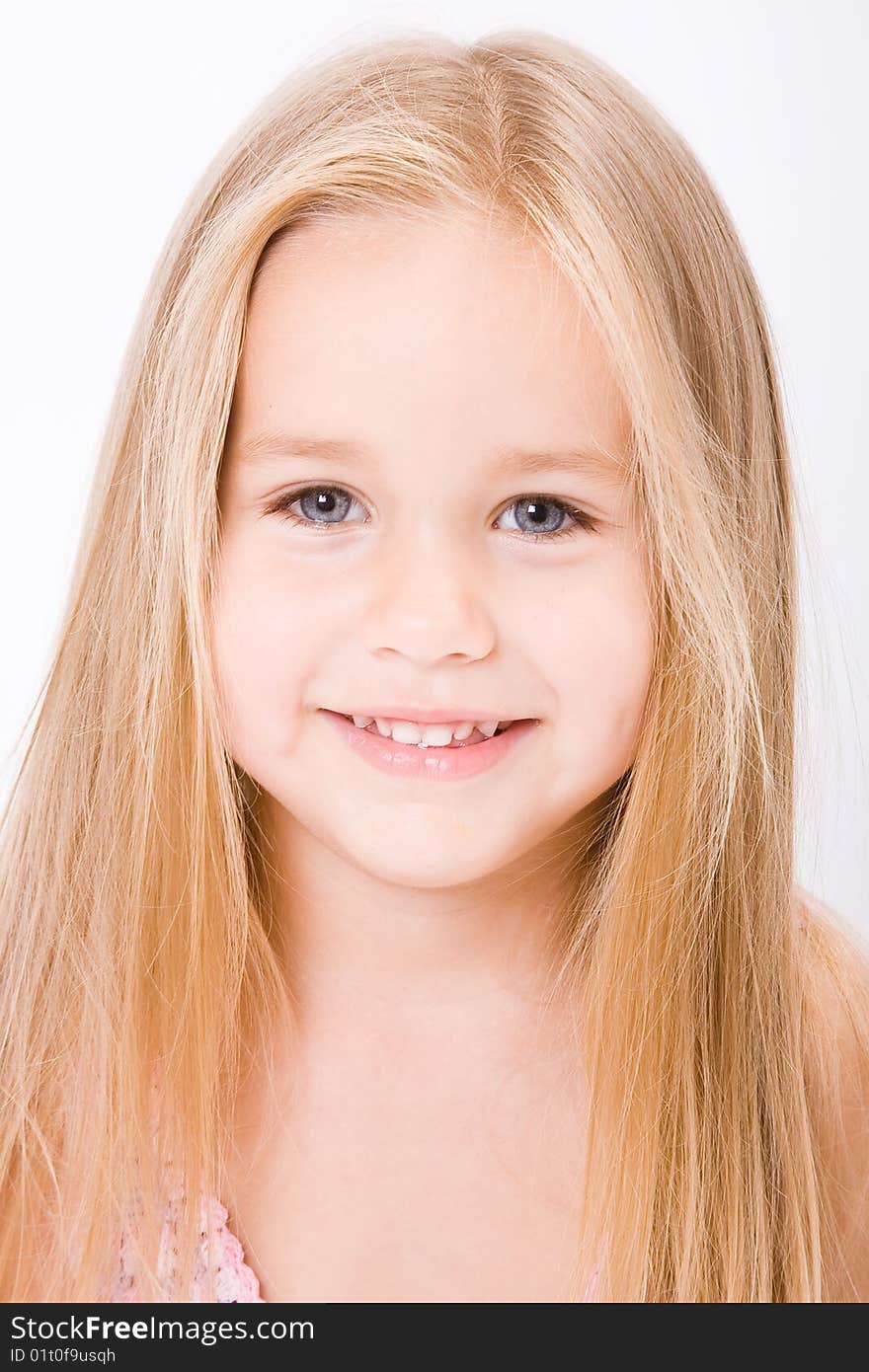 Beautiful little girl  with long blonde hair