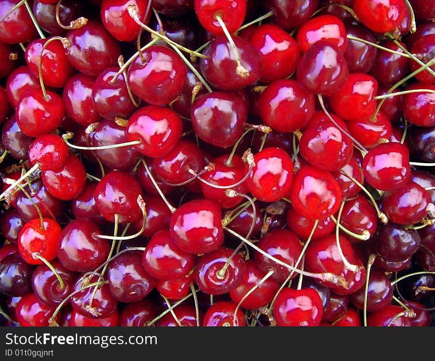 many fresh cherry fruits background. many fresh cherry fruits background