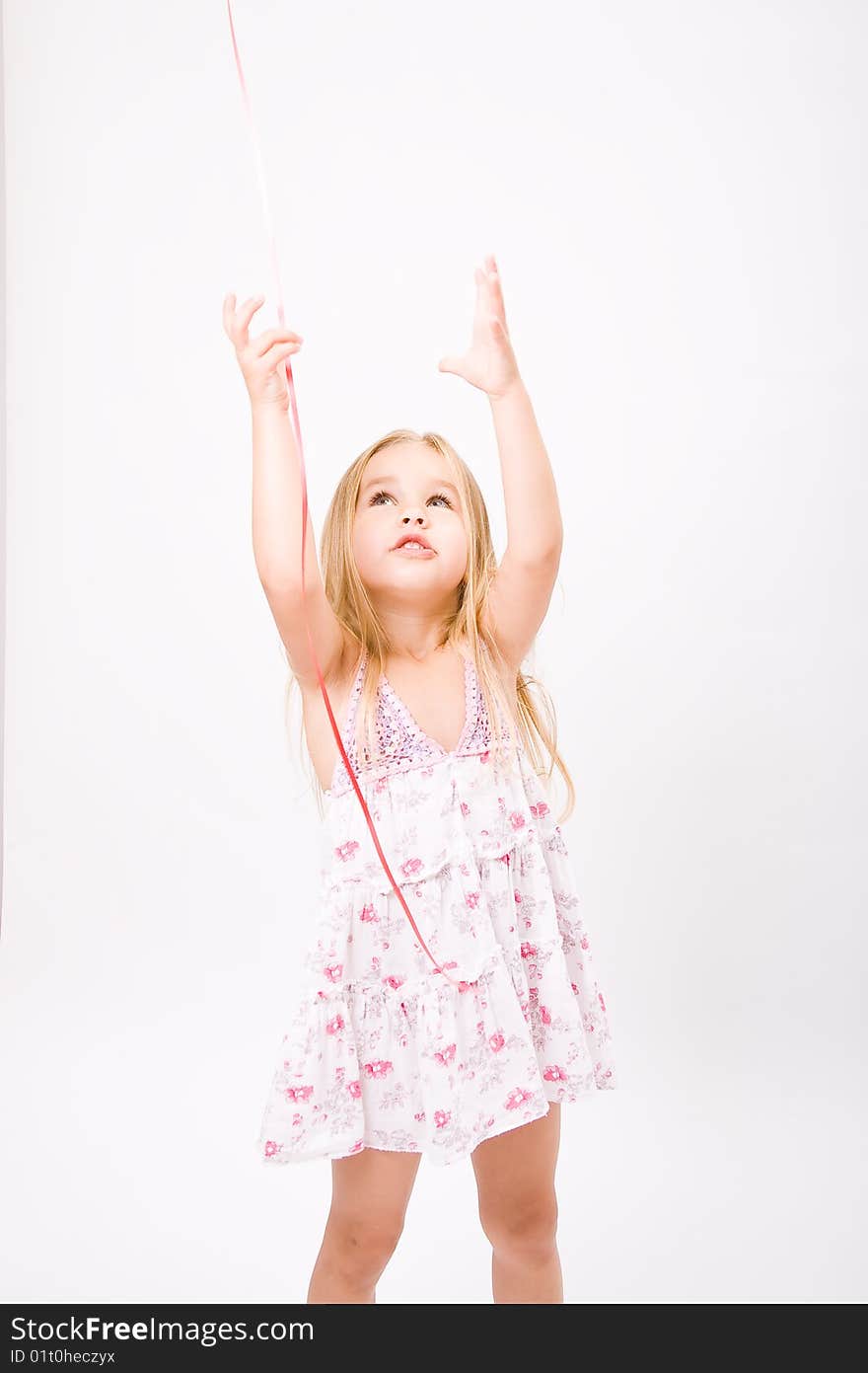 Beautiful little girl  with long blonde hair