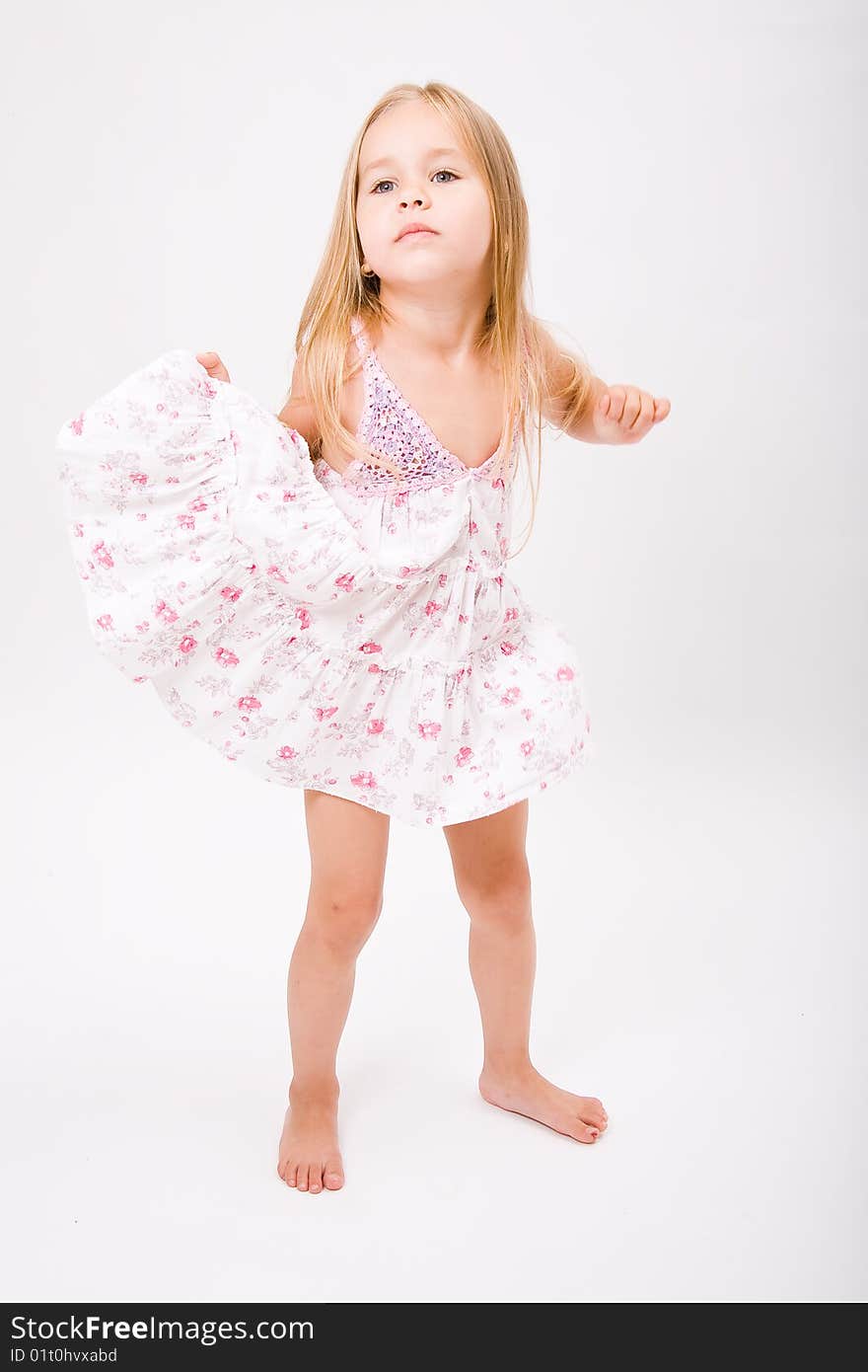 Beautiful little girl with long blonde hair