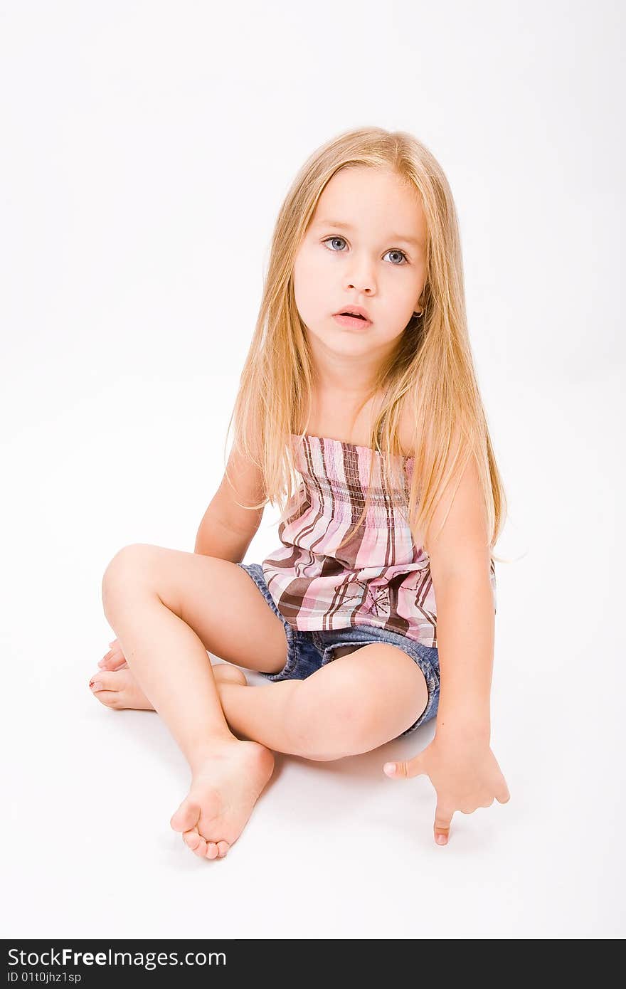 Beautiful little girl with long blonde hair