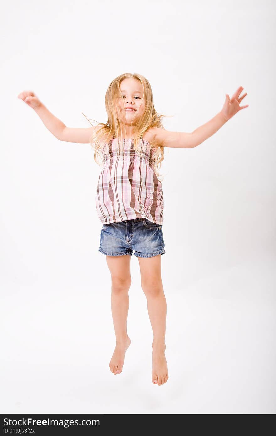 Beautiful little girl jump