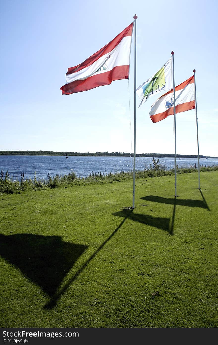 Three flags along the canals in Netherlends. Three flags along the canals in Netherlends