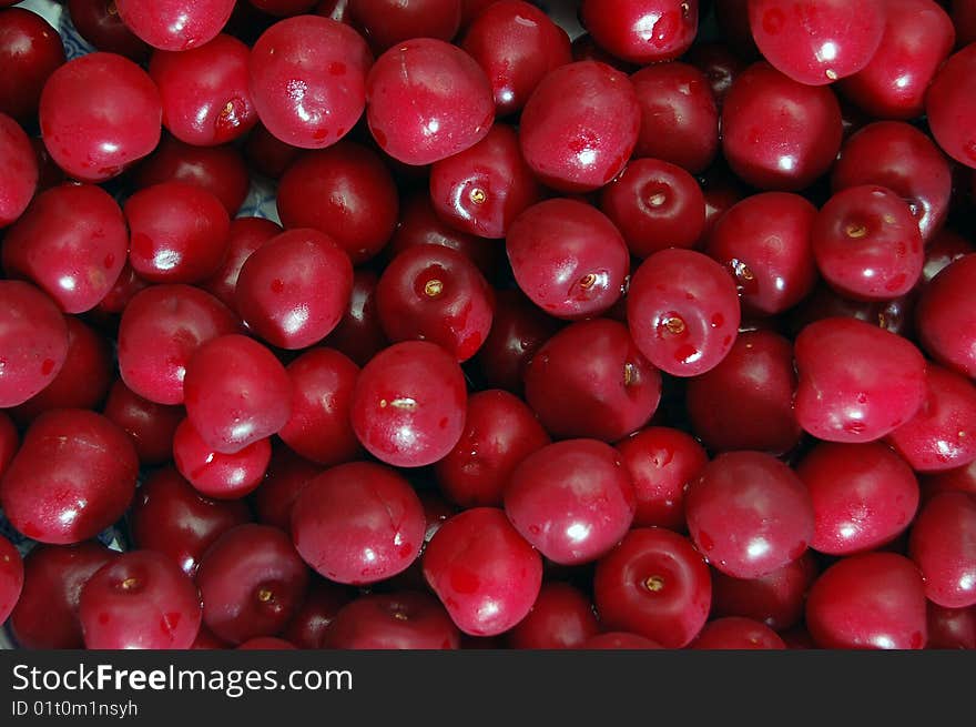 A bunch of red cherries. A bunch of red cherries.