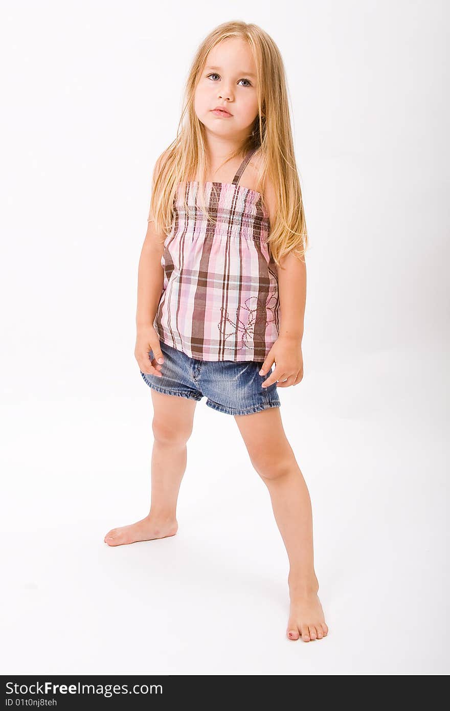 Beautiful little girl with long blonde hair