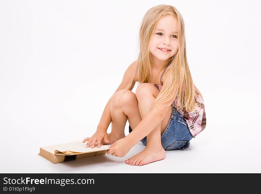 Beautiful little girl with long blonde hair