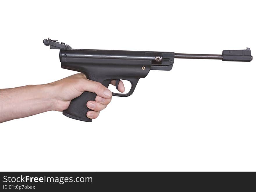 Hand with weapon of the black color on white background