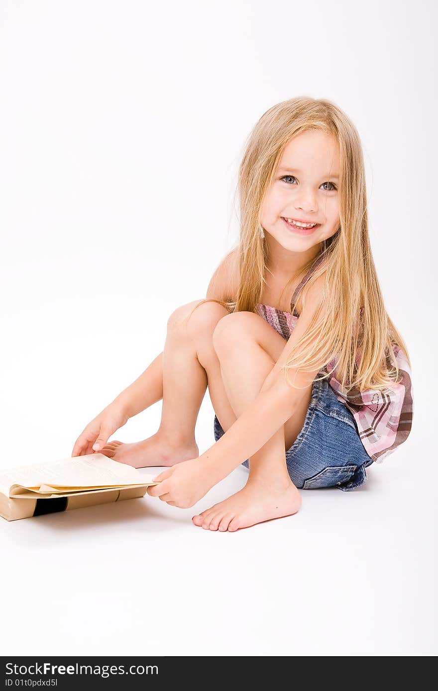 Beautiful little girl with long blonde hair