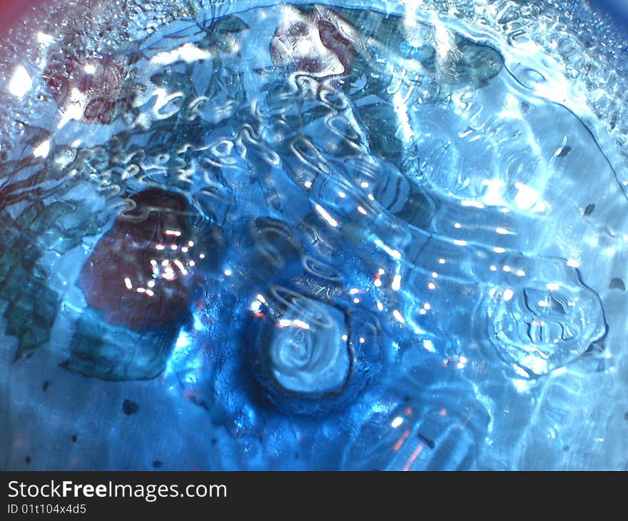 This was taken inside a blue water tank, with waves and ripples and a strong spot light that came out very cool,. This was taken inside a blue water tank, with waves and ripples and a strong spot light that came out very cool,