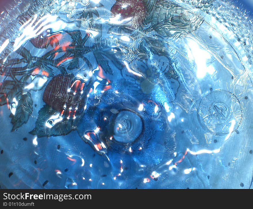 This was taken inside a blue water tank, with waves and ripples and a strong spot light that came out very cool, now with a texture. This was taken inside a blue water tank, with waves and ripples and a strong spot light that came out very cool, now with a texture