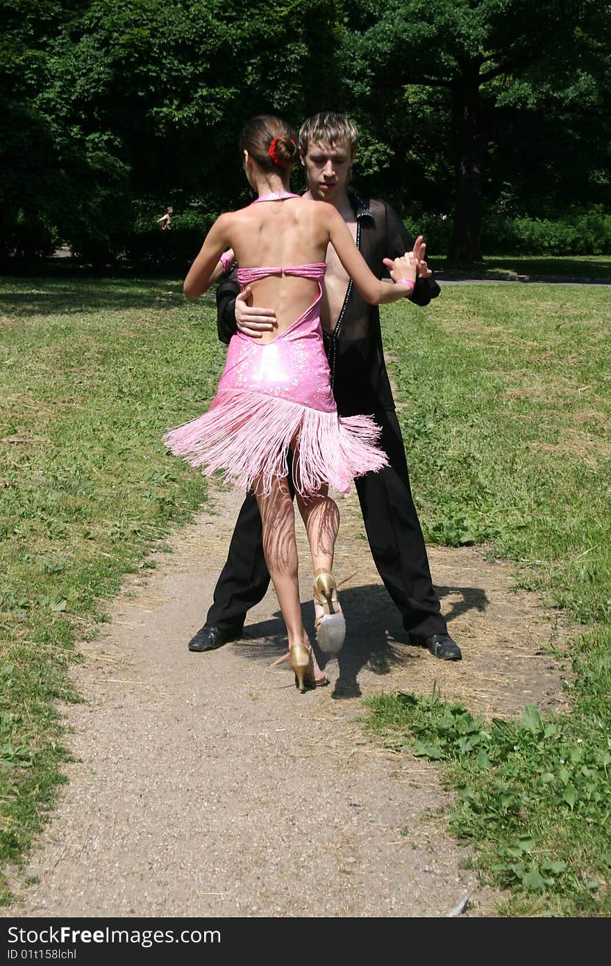 Romantic couple dancing in a park