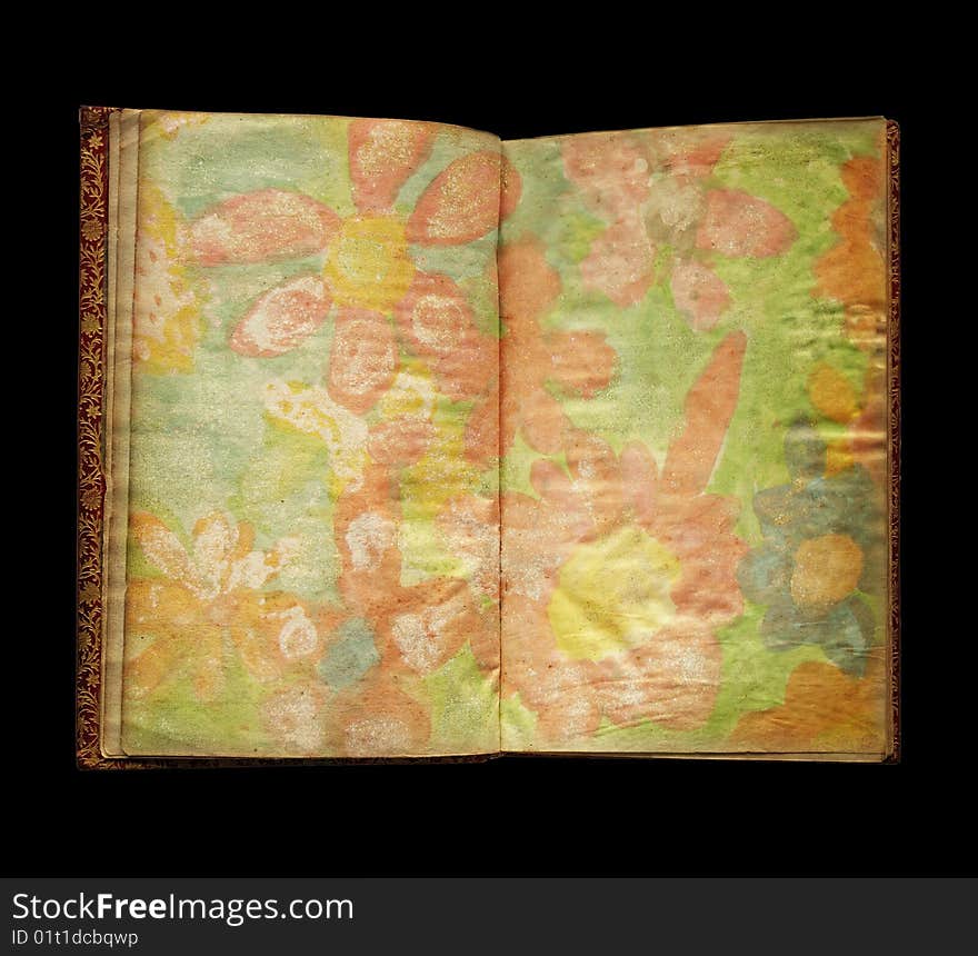 Aged book with flowers close up