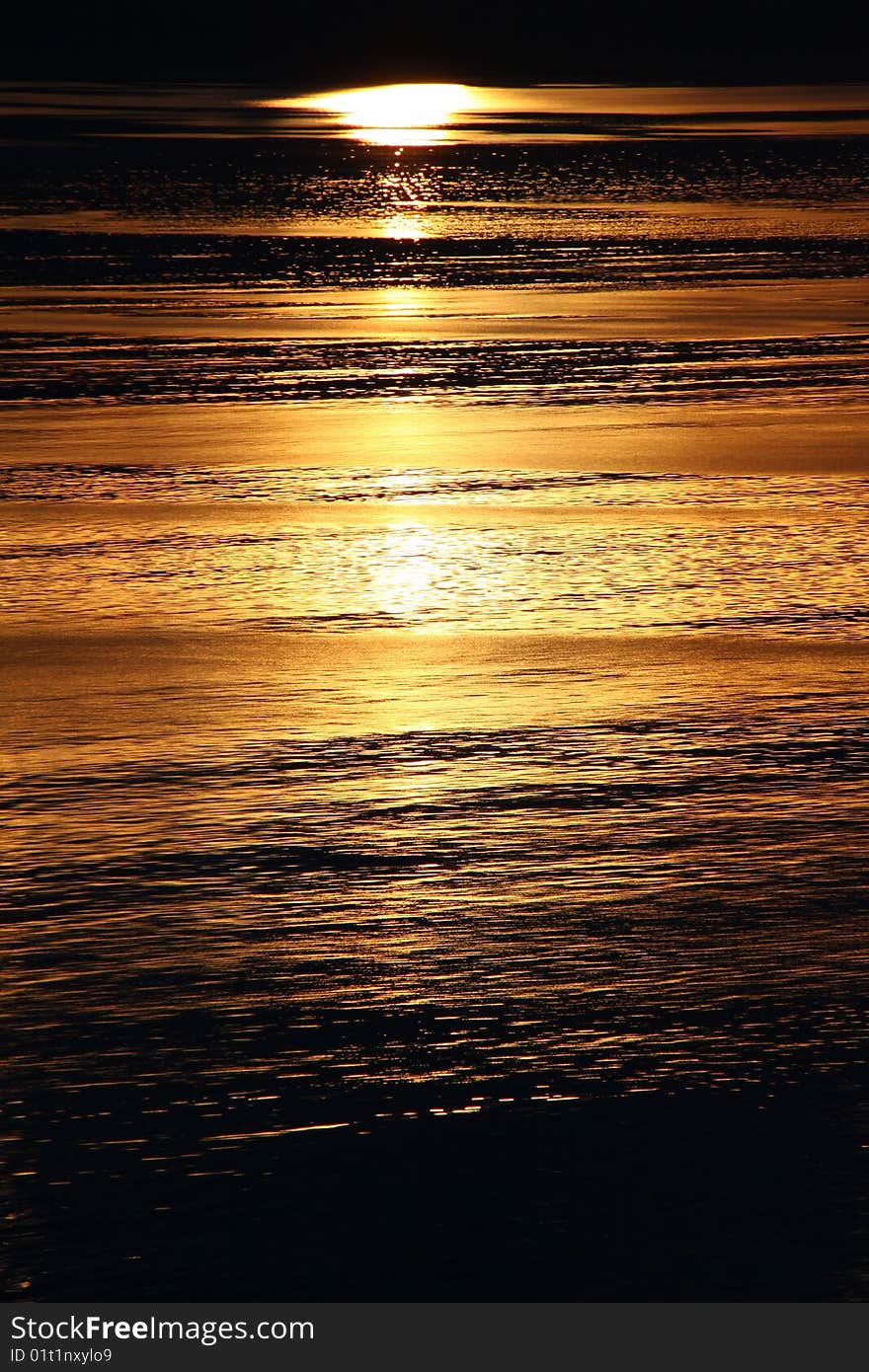 Golden Alaskan Sunrise on Water