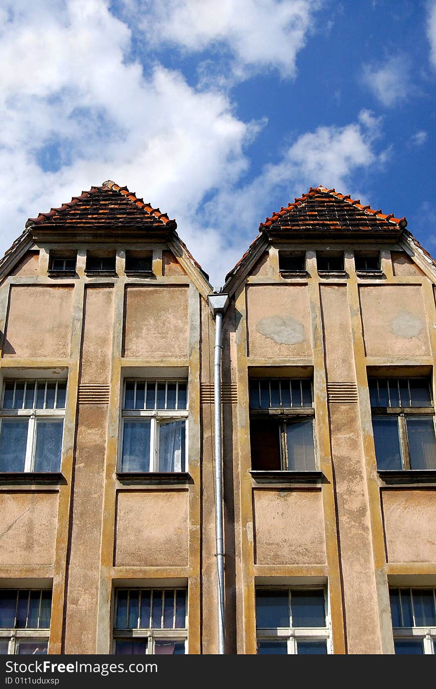 Interesting Double Roof On Beautiful Blue Sky