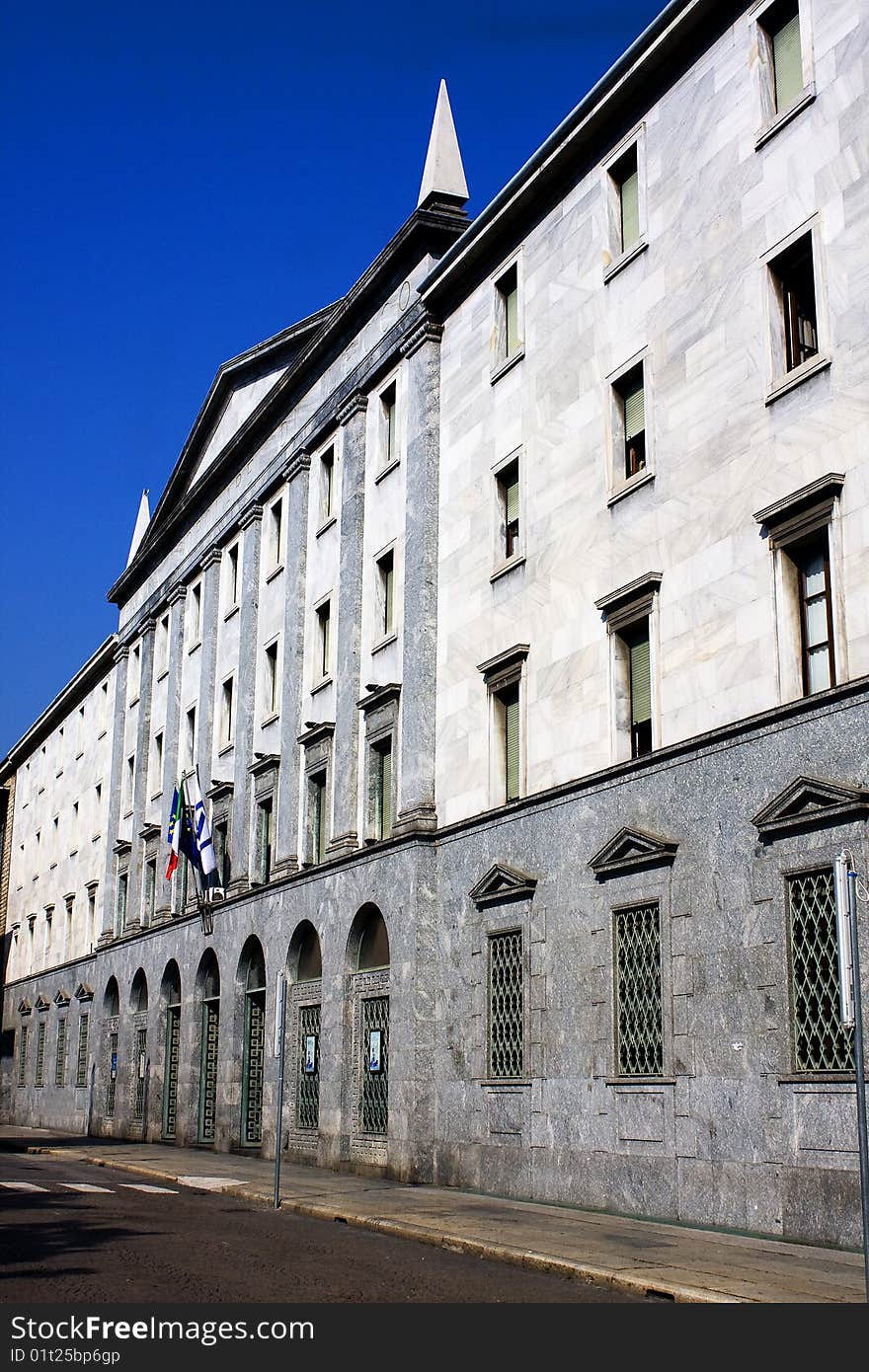 Building with banners and sky blue. Building with banners and sky blue