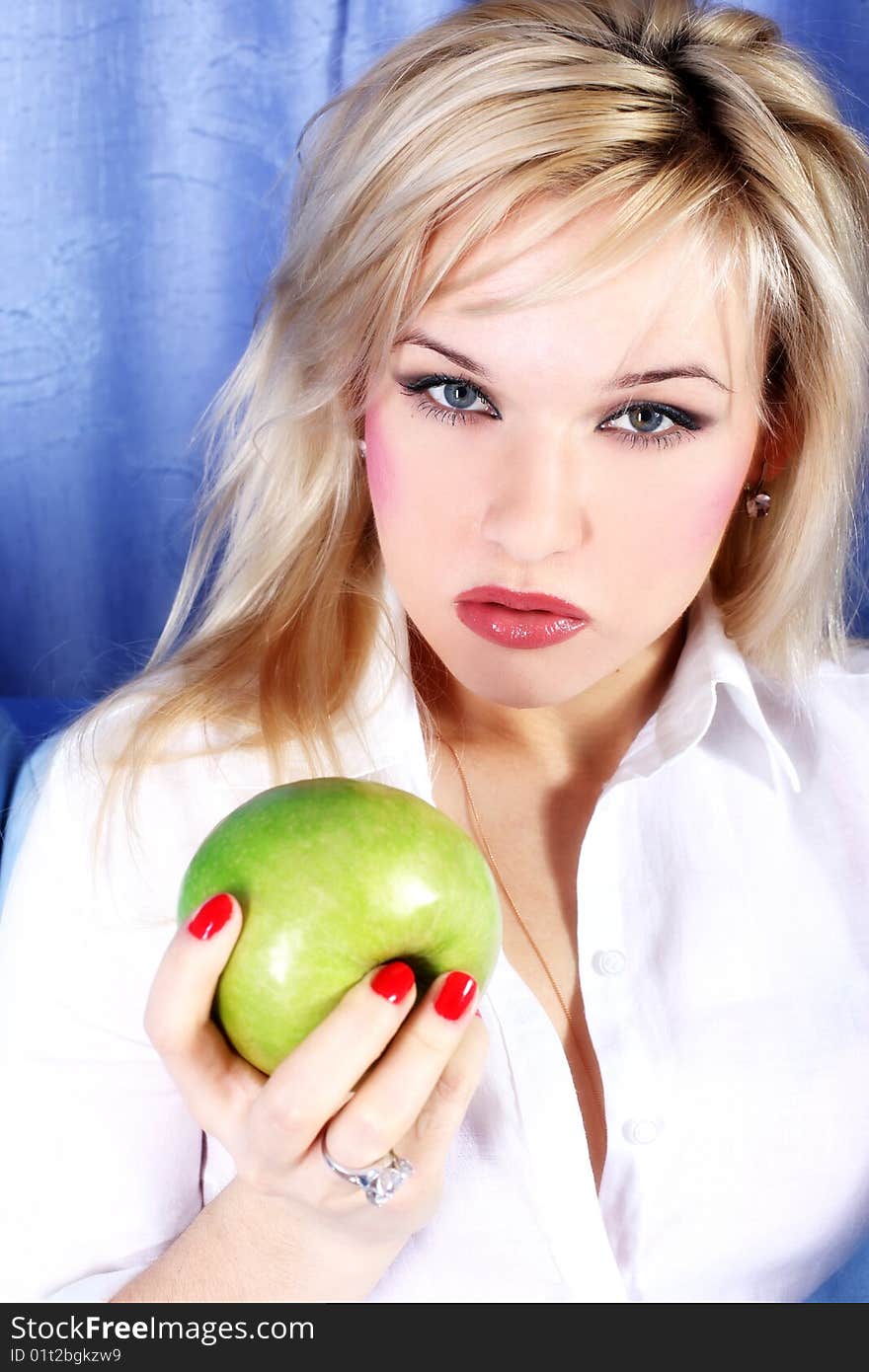 Blondie girl with green apple. Blondie girl with green apple