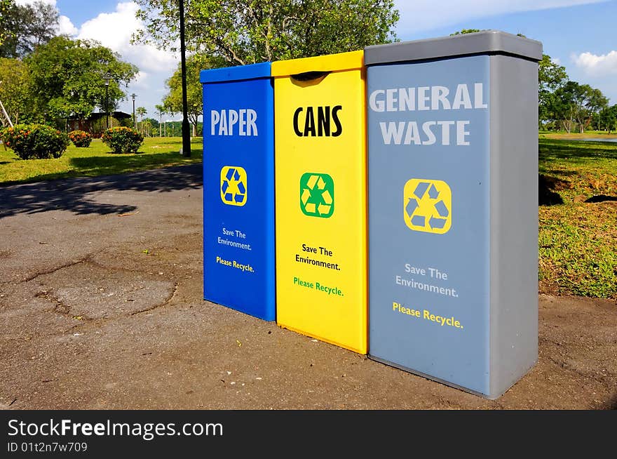 Recycling bins in a park