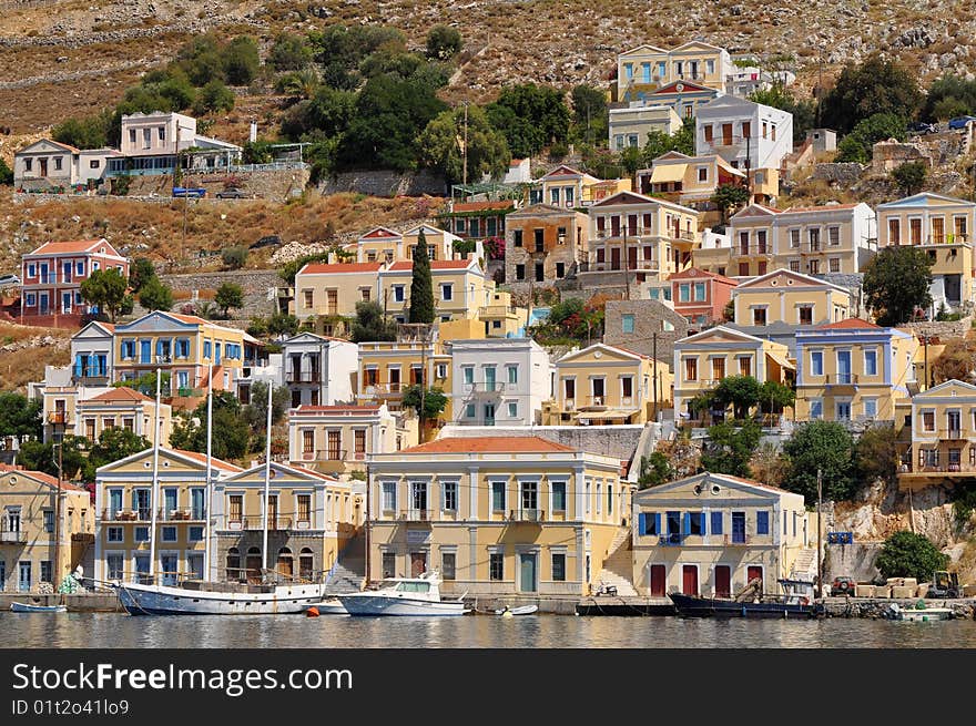 Multicolored houses on an island Symi