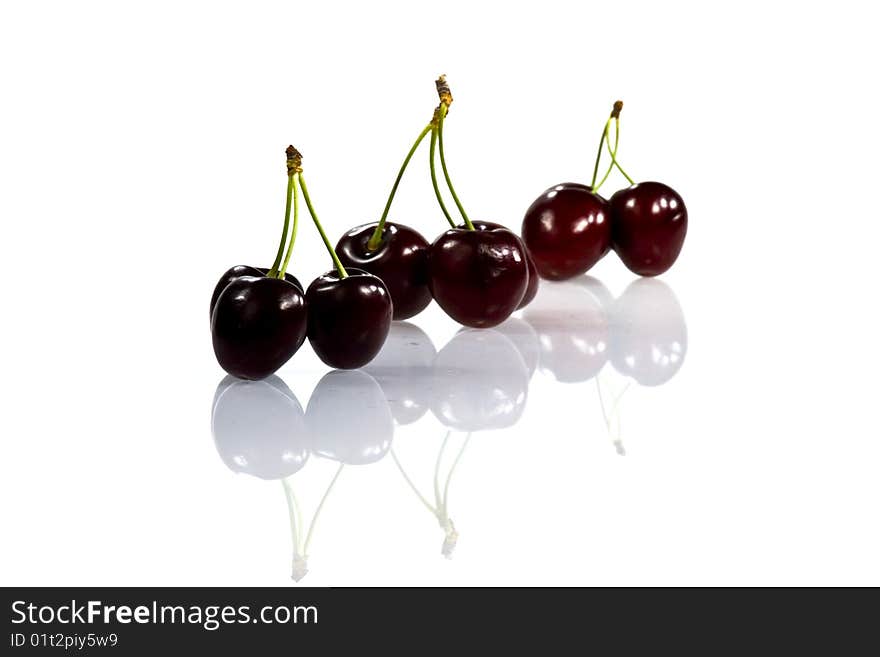 Ripe red cherries were built in a number. Ripe red cherries were built in a number