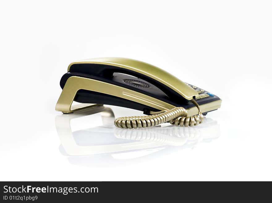 Desktop black phone with gold it is pending sonorous