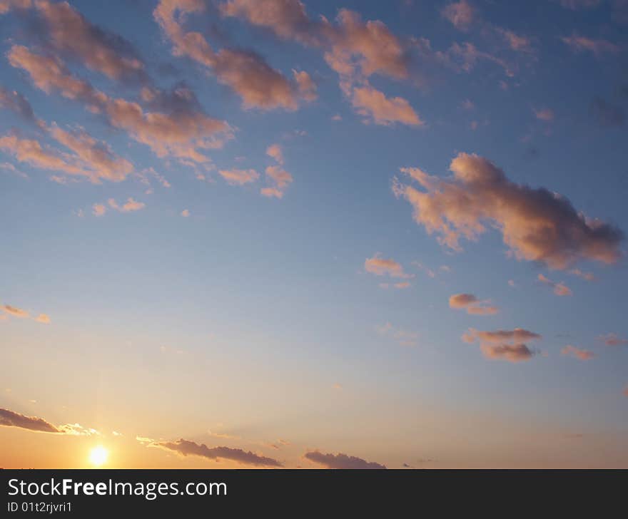 Beautiful sunrise, blue sky, clouds. Beautiful sunrise, blue sky, clouds