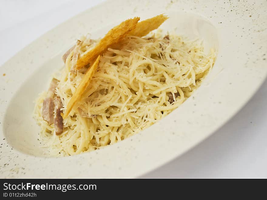 Close up of a plate with spaghetti alla carbonara with ham and parmesan,see more in <a href=http://www.dreamstime.com/restaurant-food-rcollection10721-resi828293>Restaurant food</a>