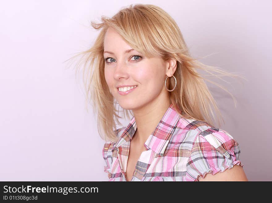 Happy blonde woman over background. Happy blonde woman over background