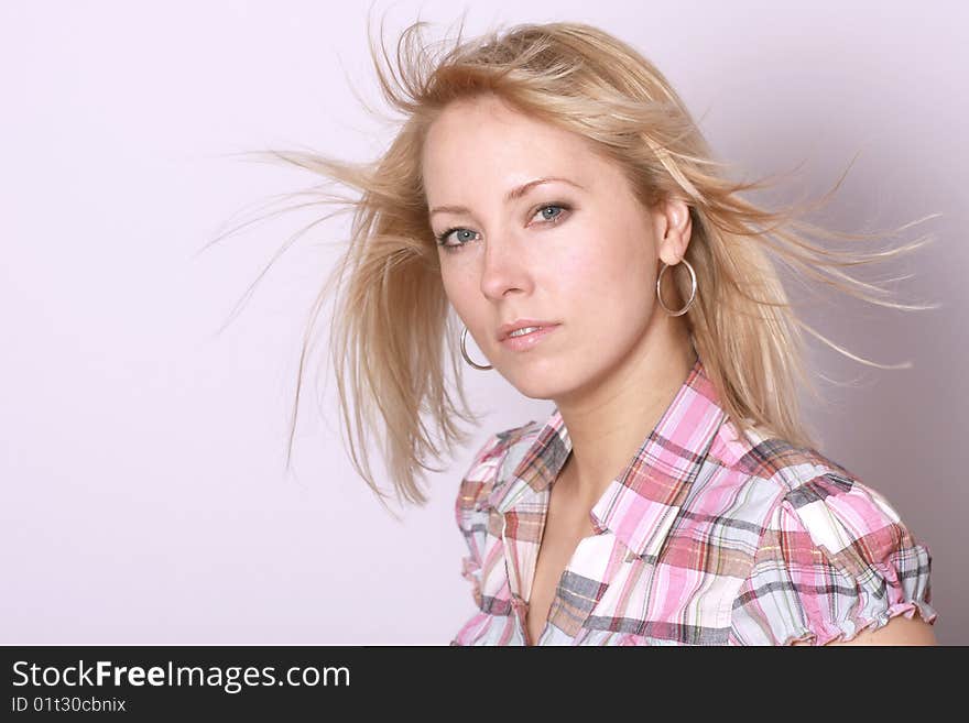 Happy blonde woman over background. Happy blonde woman over background