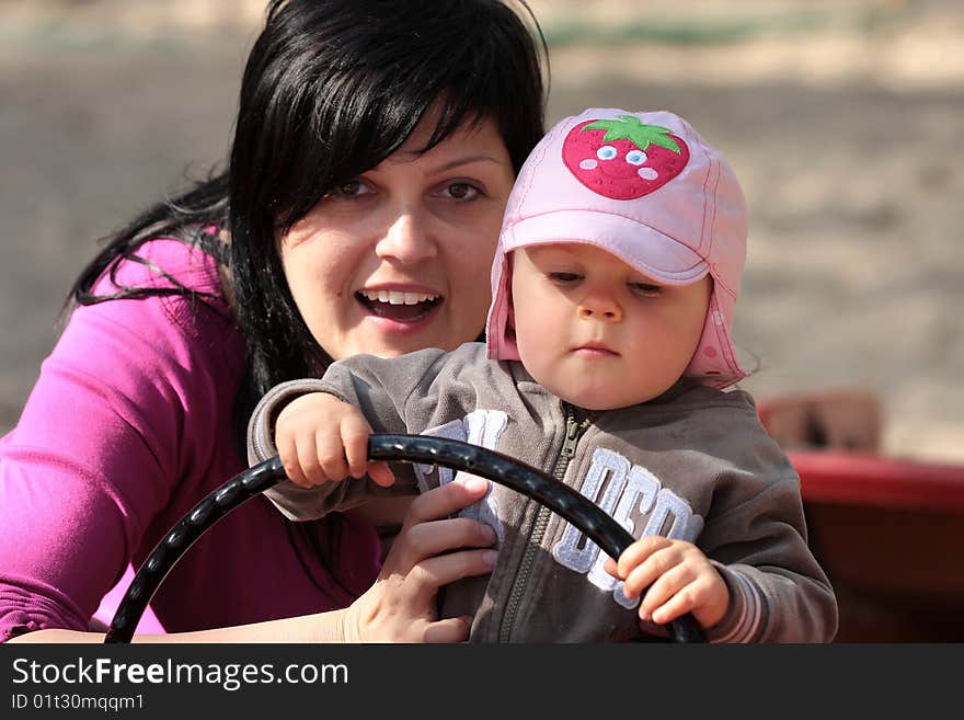 Mother and daughter in park. Mother and daughter in park