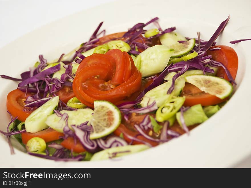 Close up of fresh salad assorted with variety of season vegetables,see more in <a href= food</a>