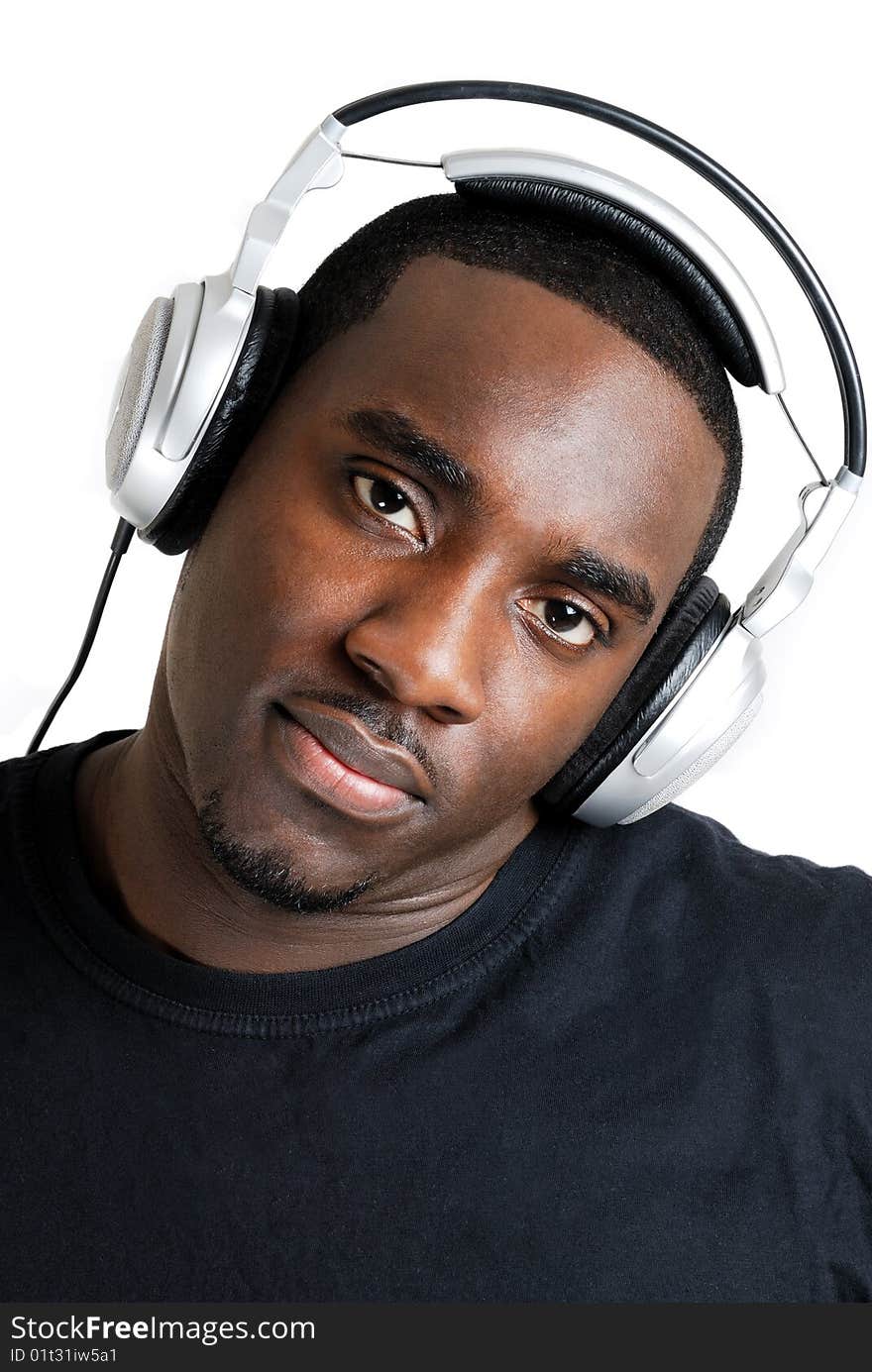 Young man listenning to music on headphones