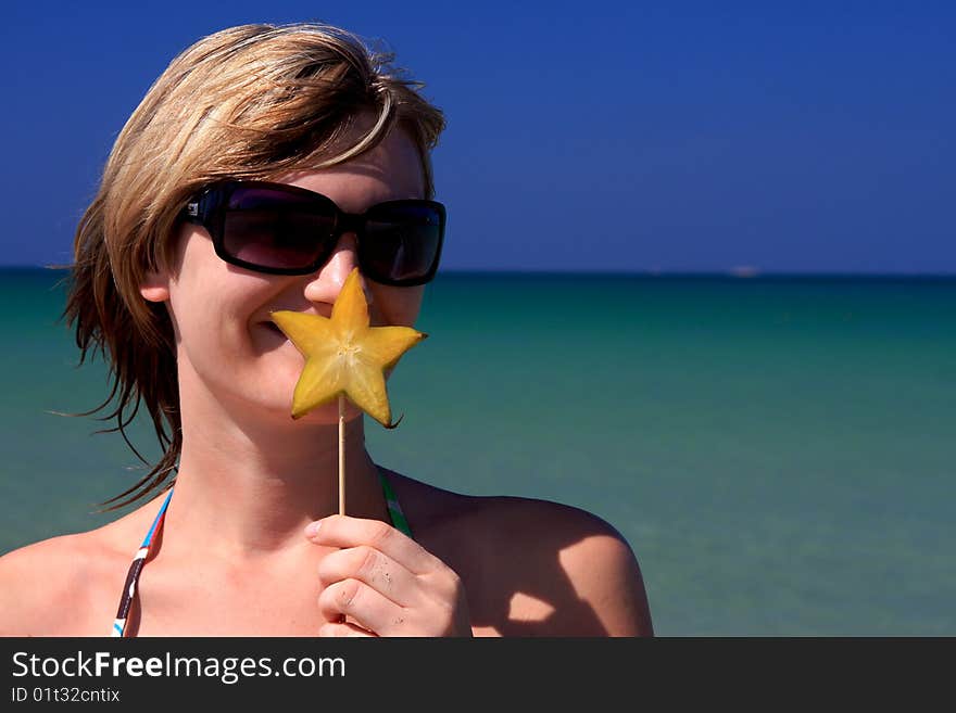 Young model posing at a beach. Young model posing at a beach