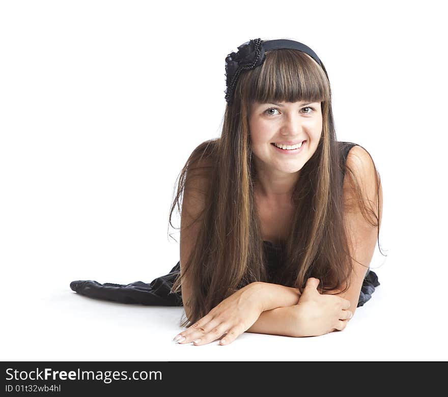 Beautiful smiling girl lying on floor