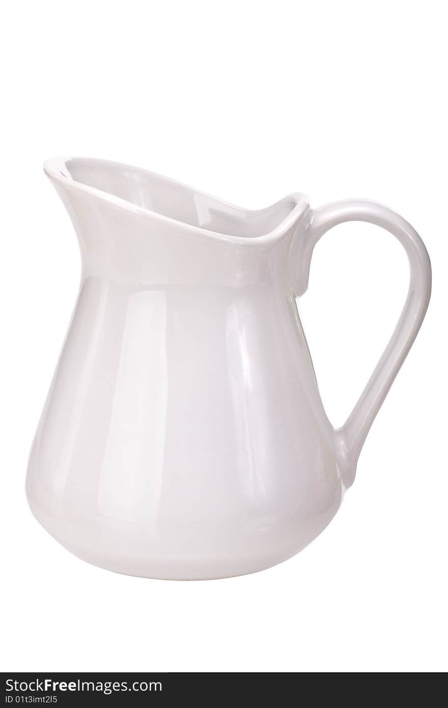 Jug, typical for serving milk. Isolated on whie background