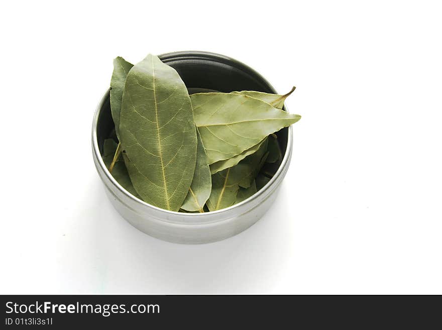 Dried bay leaves in a jar