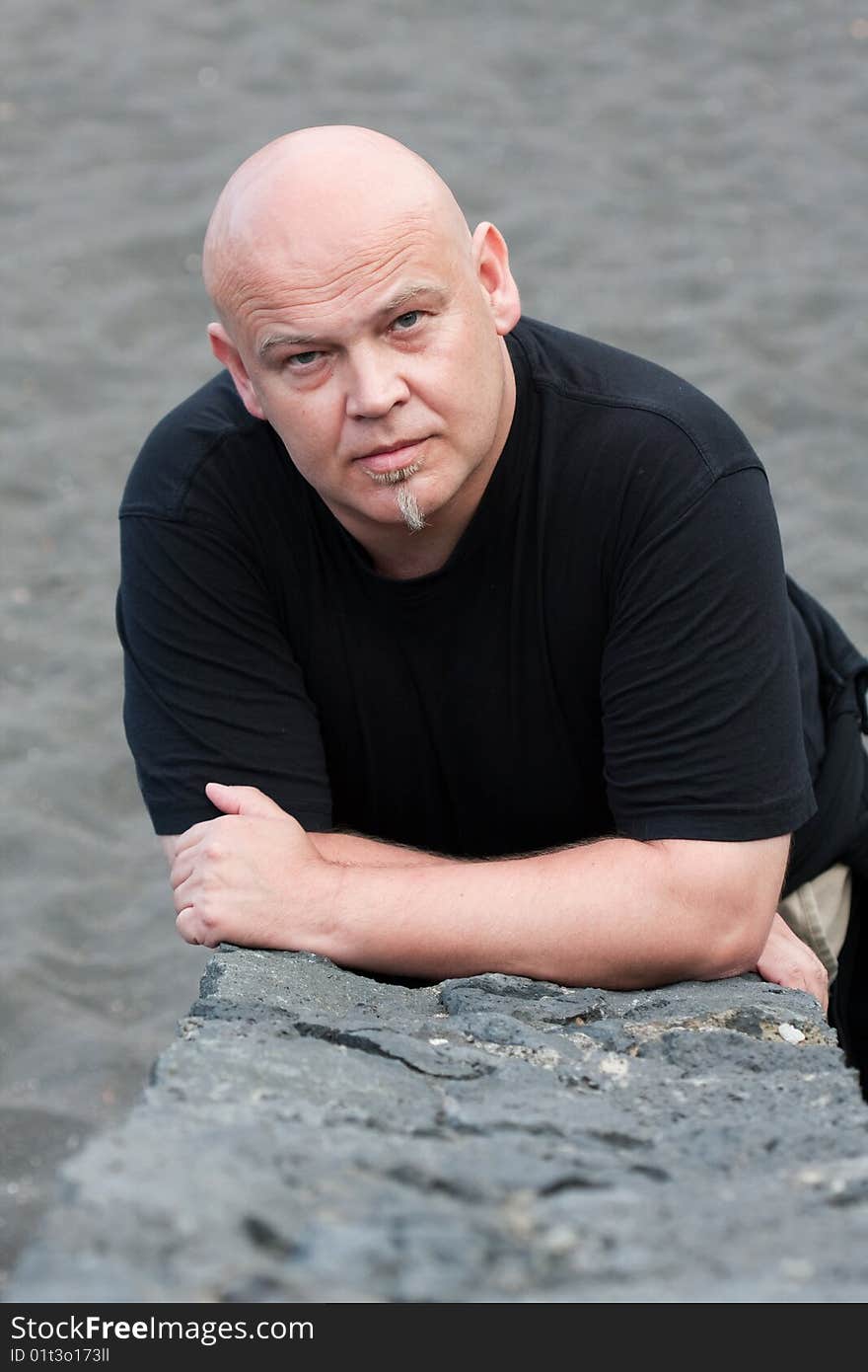 Man's portrait with bald head.