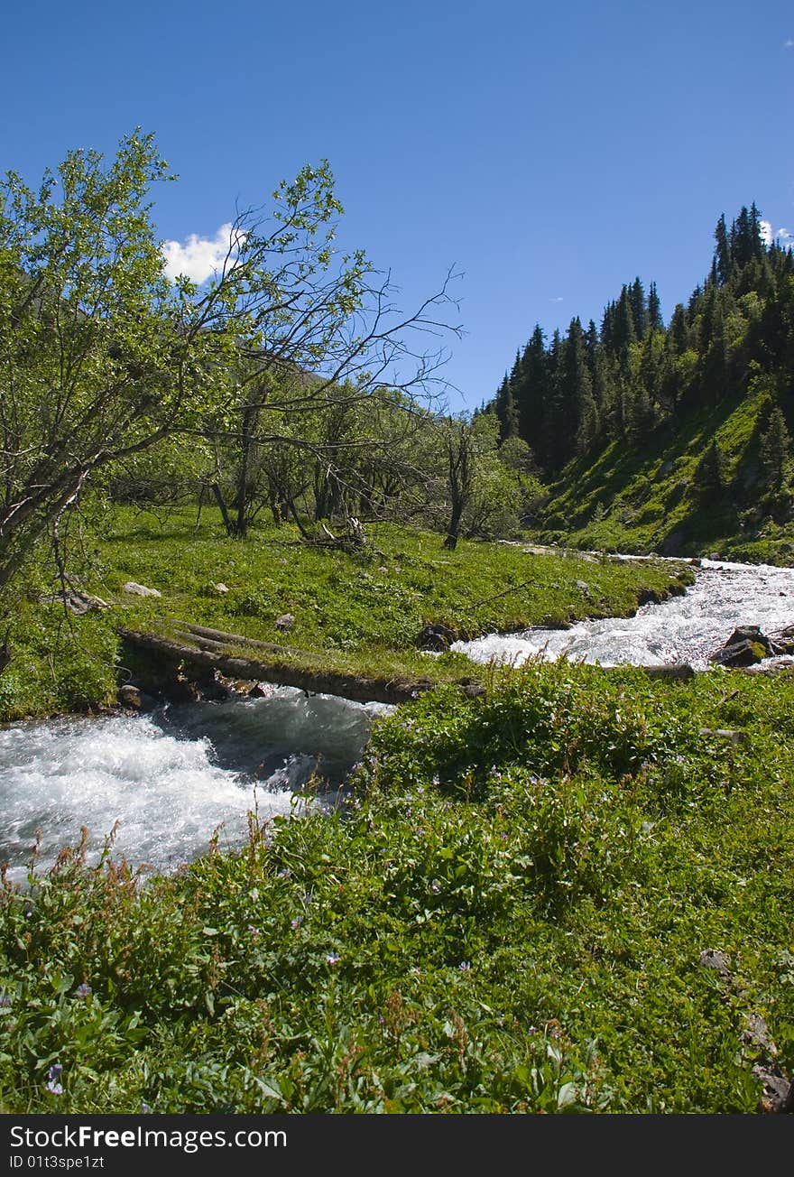 Crossing on mountain small river. Crossing on mountain small river