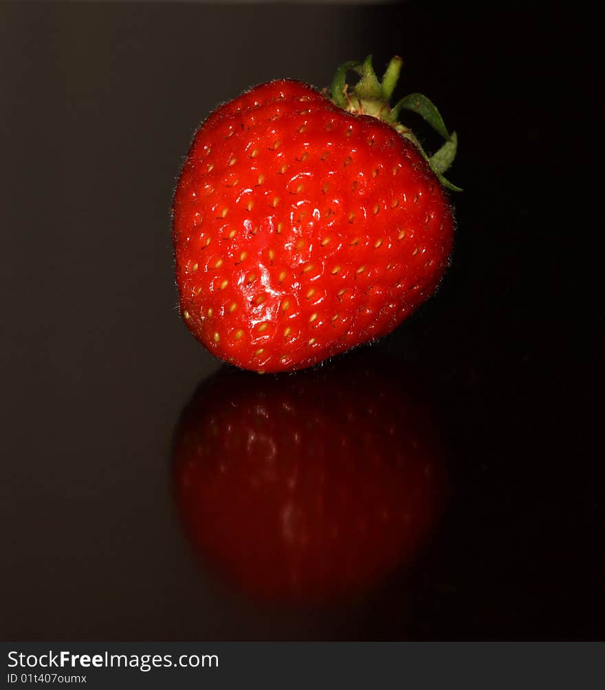 A close up of a juicy Strawberry