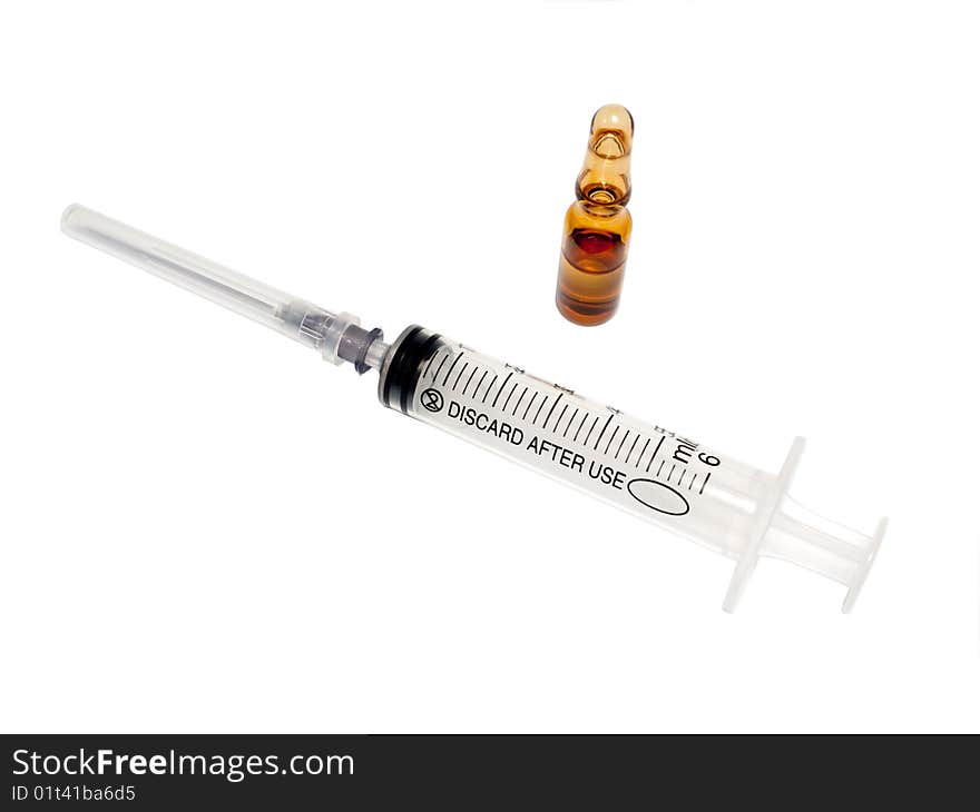 Syringe and drug ampula on white background. Syringe and drug ampula on white background.