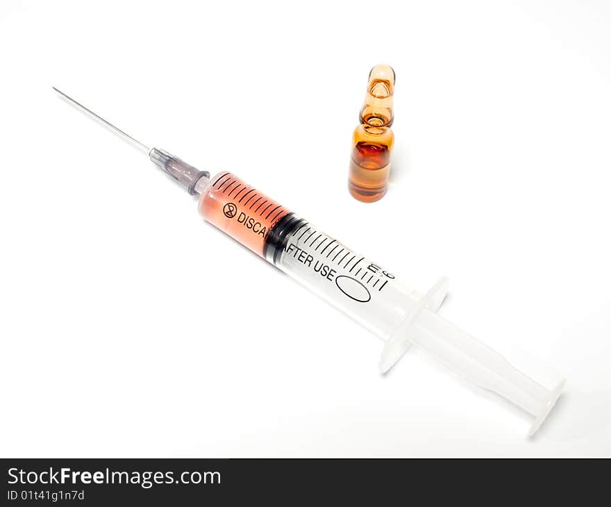 Filled syringe and drug ampula.