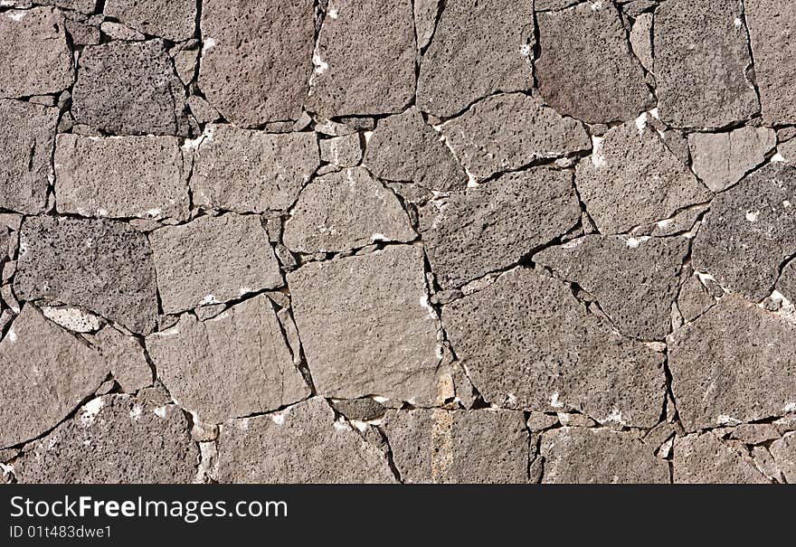 Old stone wall without cement