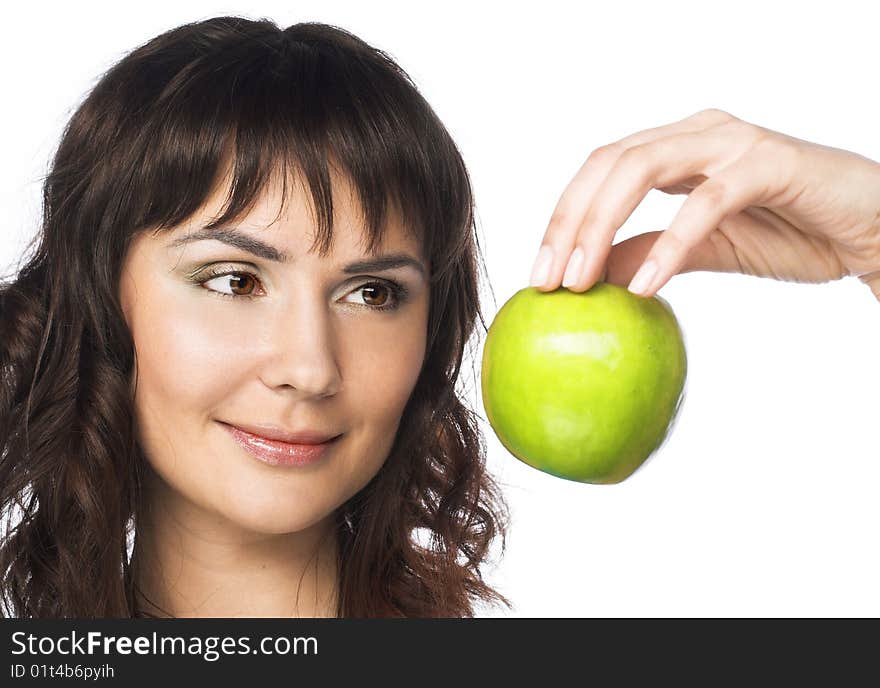 Portrait of young pretty woman with apple