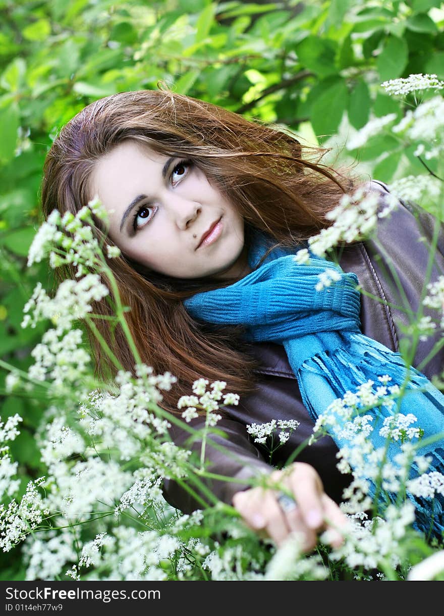 Portrait Of Young Woman In Blue Scarf