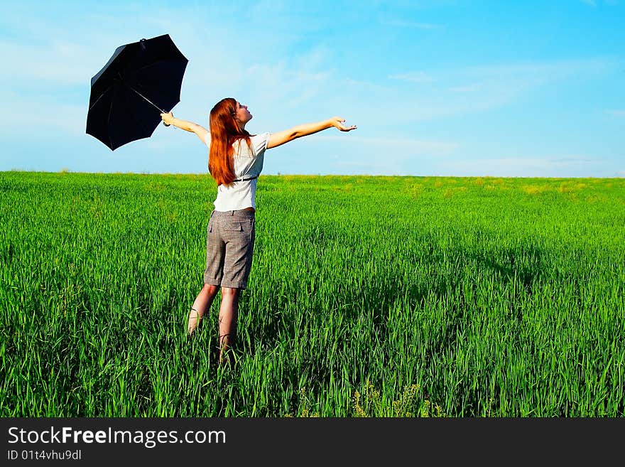 Business-kontsept on the nature with an umbrella